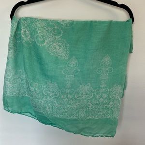 Teal and white patterned scarf
